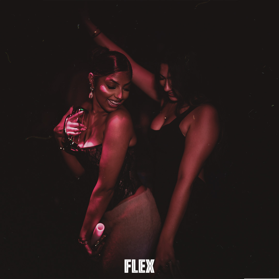 Two guests enjoying a Flex event