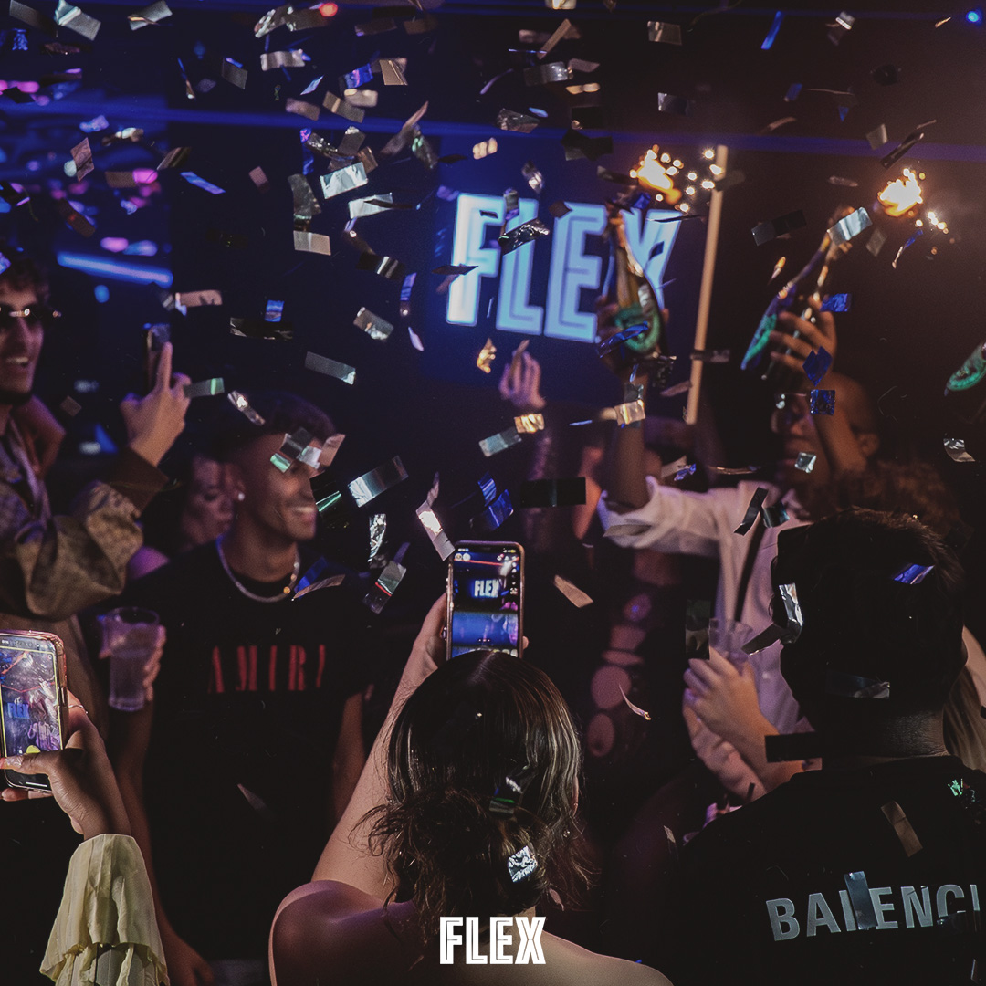 The Flex crowd celebrating beneath falling confetti