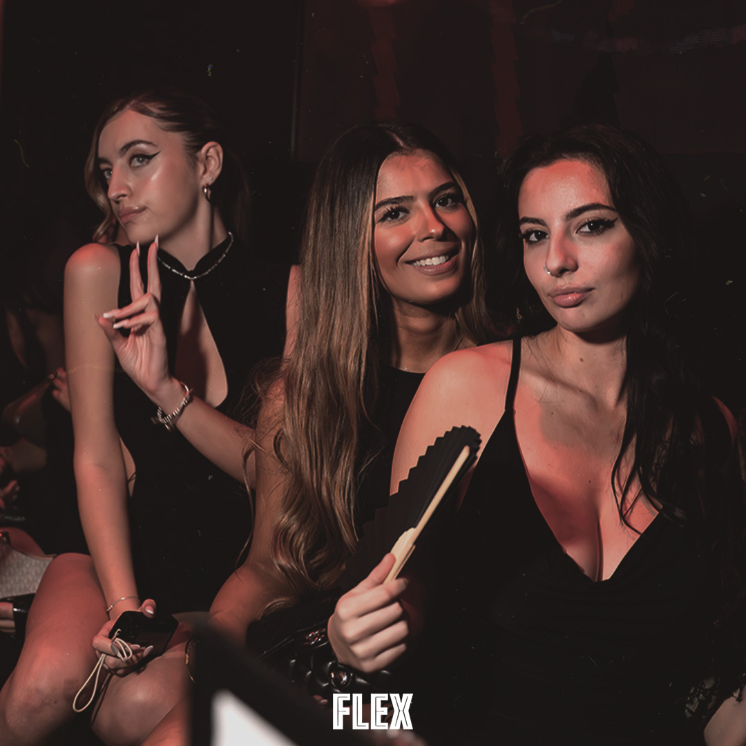 Three guests posing together at Flex